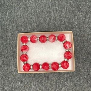 red bracelet